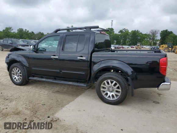 2011 Nissan Frontier Pro-4X with VIN 1N6AD0EVXBC433028, listed as a Copart auction lot 57653305 with 144,753 mi miles and Salvage title. Bid and sale history available at DreamBid. Image 2.