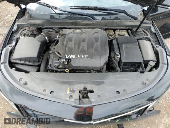 2014 Chevrolet Impala LT z VIN 2G1125S3XE9234719, wystawiony jako Copart lot #58139885 z przebiegiem 120 561 mil mil oraz Szkoda całkowita • Salvage title. Historia ofert i sprzedaży dostępna na DreamBid. Obrazek 11.