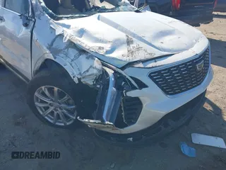 2022 Cadillac XT4 FWD Luxury with VIN 1GYAZAR48NF170949, listed as a IAAI auction lot 41857671 with 25,881 mi miles and . Bid and sale history available at carsss.com. Image 10.