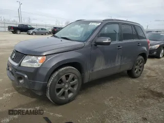 2012 Suzuki Grand Vitara Limited z VIN JS3TD0D74C4100965, wystawiony jako Copart lot #52727894 z przebiegiem 150 760 mil mil oraz Szkoda całkowita • Salvage title. Historia ofert i sprzedaży dostępna na DreamBid. Obrazek 1.