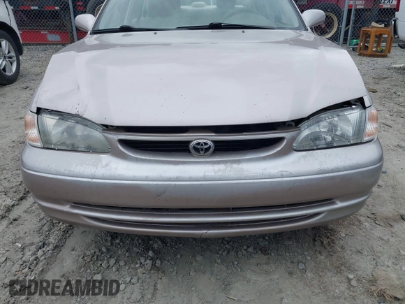 1998 Toyota Corolla VE z VIN 2T1BR18EXWC015480, wystawiony jako IAAI lot #41959316 z przebiegiem 224 304 mil mil oraz . Historia ofert i sprzedaży dostępna na DreamBid. Obrazek 6.