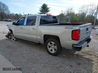 2016 Chevrolet Silverado 1500 LT with VIN 3GCUKREC4GG278179, listed as a IAAI auction lot 41863441 with 158,718 mi miles. Bid and sale history available at carsss.com. Image 3.