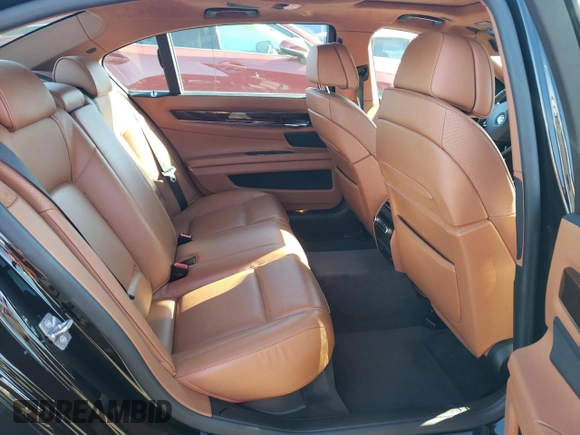 2011 BMW 7 Series 750Li with VIN WBAKB8C52BCY66628, listed as a Copart auction lot 77191054 with 39,503 mi miles and Salvage title. Bid and sale history available at DreamBid. Image 10.