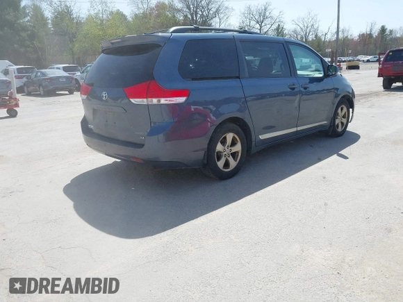 2014 Toyota Sienna LE AAS with VIN 5TDKK3DC1ES436031, listed as a IAAI auction lot 42147191 with 276,821 mi miles. Bid and sale history available at carsss.com. Image 4.