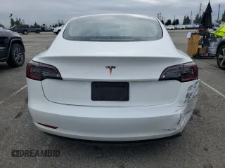 2023 Tesla Model 3 with VIN 5YJ3E1EA2PF569109, listed as a Copart auction lot 48527155 with 30,458 mi miles and Salvage Title. Bid and sale history available at carsss.com. Image 6.