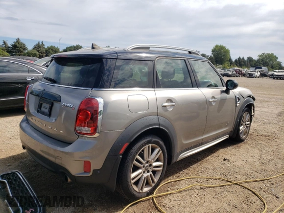 2017 MINI Countryman Cooper S with VIN WMZYT5C33H3D81529, listed as a Copart auction lot 66308674 with 96,091 mi miles and Salvage Title. Bid and sale history available at carsss.com. Image 3.