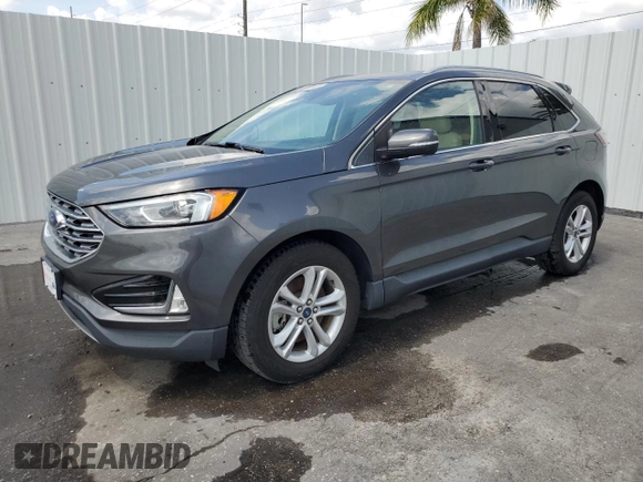 2020 Ford Edge SEL с VIN 2FMPK4J95LBB17293, выставлен на аукционе Copart как лот 58796255 с пробегом 82 583 миль миль и Чистый • Clean title. История ставок и продаж доступна на DreamBid. Изображение 1.