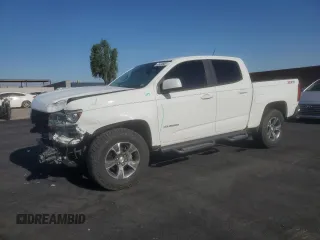 2017 Chevrolet Colorado 4WD Z71 with VIN 1GCGTDEN9H1180800, listed as a Copart auction lot 60430985 with 104,930 mi miles and Salvage title. Bid and sale history available at DreamBid. Image 1.