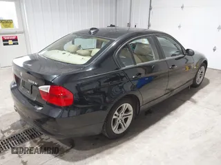 2008 BMW 3 Series 328xi with VIN WBAVC93538K043317, listed as a IAAI auction lot 41544348 with 127,823 mi miles. Bid and sale history available at carsss.com. Image 4.