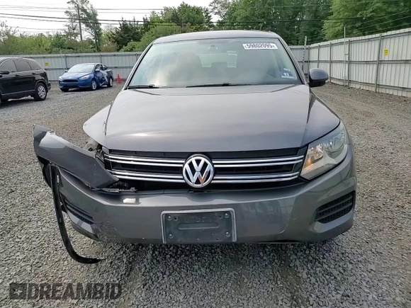 2013 Volkswagen Tiguan S с VIN WVGBV3AX6DW592011, выставлен на аукционе Copart как лот 59802095 с пробегом 112 485 миль миль и Списание • Salvage title. История ставок и продаж доступна на DreamBid. Изображение 14.