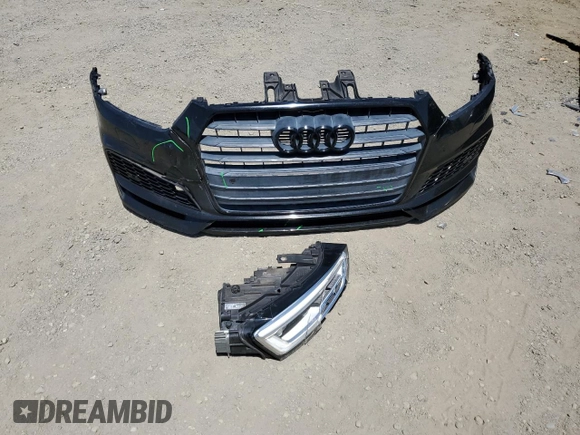 2018 Audi Q3 Premium Plus z VIN WA1JCCFSXJR027087, wystawiony jako Copart lot #58527985 z przebiegiem 99 372 mil mil oraz Szkoda całkowita • Salvage title. Historia ofert i sprzedaży dostępna na DreamBid. Obrazek 13.