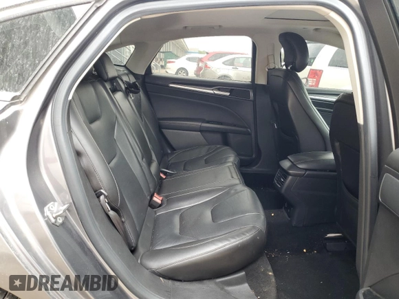 2013 Ford Fusion Titanium Hybrid with VIN 3FA6P0RU9DR309263, listed as a Copart auction lot 72704284 with 157,035 mi miles and Non Repairable. Bid and sale history available at carsss.com. Image 11.