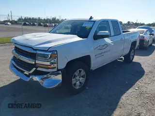 2018 Chevrolet Silverado 1500 LT with VIN 1GCRCREC1JZ153165, listed as a IAAI auction lot 41737258 with 130,475 mi miles and . Bid and sale history available at DreamBid. Image 18.