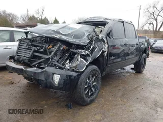 2018 Chevrolet Silverado 1500 LT with VIN 3GCUKREC7JG497399, listed as a IAAI auction lot 41497685 with 179,811 mi miles. Bid and sale history available at carsss.com. Image 2.
