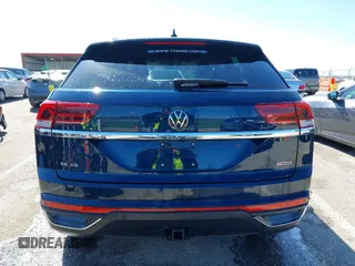 2021 Volkswagen Atlas SE z VIN 1V2KE2CA7MC220524, wystawiony jako IAAI lot #42017287 z przebiegiem 29 380 mil mil oraz . Historia ofert i sprzedaży dostępna na DreamBid. Obrazek 16.