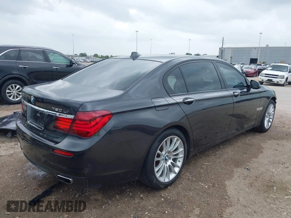 2014 BMW 7 Series ALPINA B7 z VIN WBAYE8C57ED134799, wystawiony jako IAAI lot #41891633 z przebiegiem 96 411 mil mil oraz . Historia ofert i sprzedaży dostępna na DreamBid. Obrazek 4.