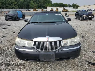 2000 Lincoln Town Car Executive с VIN 1L1FM81W8YY771526, выставлен на аукционе Copart как лот 65654725 с пробегом 51 048 миль миль и Чистый • Clean title. История ставок и продаж доступна на DreamBid. Изображение 5.