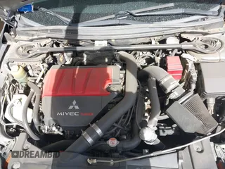 2014 Mitsubishi Lancer Evolution GSR with VIN JA32W8FV3EU008262, listed as a IAAI auction lot 41653902 with 128,977 mi miles. Bid and sale history available at carsss.com. Image 10.