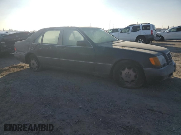 1994 Mercedes-Benz S with VIN WDBGA51EXRA151565, listed as a Copart auction lot 83085464 with 217,188 mi miles and Clean Title. Bid and sale history available at DreamBid. Image 4.