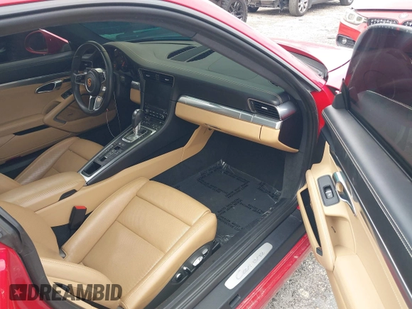 2018 Porsche 911 Carrera with VIN WP0AA2A92JS106143, listed as a IAAI auction lot 42009215 with 36,754 mi miles and . Bid and sale history available at DreamBid. Image 5.
