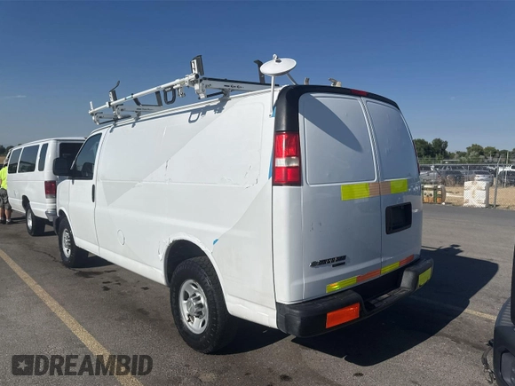 2014 Chevrolet Express Cargo with VIN 1GCWGFCA8E1121812, listed as a IAAI auction lot 42843730 with 128,506 mi miles and . Bid and sale history available at DreamBid. Image 12.