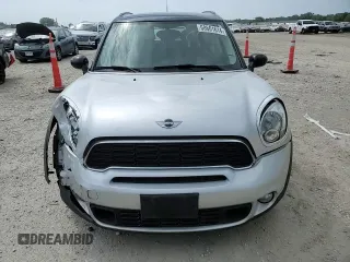 2014 MINI Countryman S with VIN WMWZC5C55EWM18087, listed as a Copart auction lot 68661614 with Not provided miles and Salvage title. Bid and sale history available at DreamBid. Image 11.