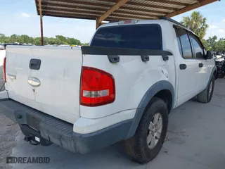 2007 Ford Explorer Sport Trac XLT with VIN 1FMEU31K87UA14190, listed as a IAAI auction lot 42093553 with 103,077 mi miles. Bid and sale history available at carsss.com. Image 4.