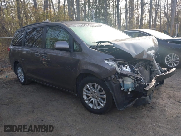 2011 Toyota Sienna XLE AAS with VIN 5TDYK3DC2BS093980, listed as a IAAI auction lot 42064568 with 196,893 mi miles. Bid and sale history available at carsss.com. Image 1.