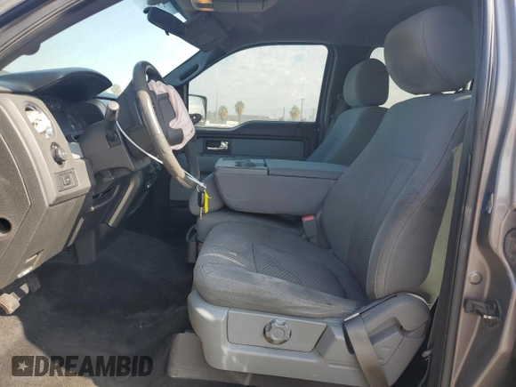 2014 Ford F-150 XL с VIN 1FTFW1EF5EKD53633, выставлен на аукционе Copart как лот 62873425 с пробегом 133 661 миль миль и Списание • Salvage title. История ставок и продаж доступна на DreamBid. Изображение 7.