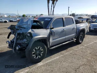 2020 Toyota Tacoma SR5 with VIN 3TMAZ5CN5LM128413, listed as a Copart auction lot 57114835 with Not provided miles and Salvage title. Bid and sale history available at DreamBid. Image 1.