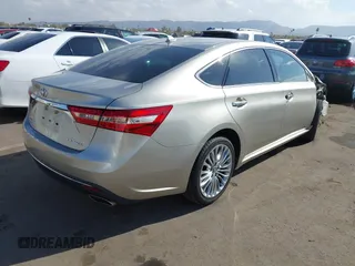 2018 Toyota Avalon XLE with VIN 4T1BK1EBXJU268188, listed as a IAAI auction lot 41441923 with 42,057 mi miles and . Bid and sale history available at DreamBid. Image 4.