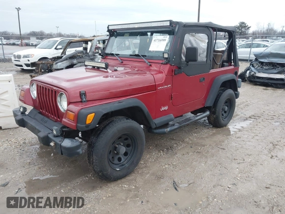 1999 Jeep Wrangler SE with VIN 1J4FY29P6XP408738, listed as a IAAI auction lot 41716999 with 124,692 mi miles. Bid and sale history available at carsss.com. Image 2.