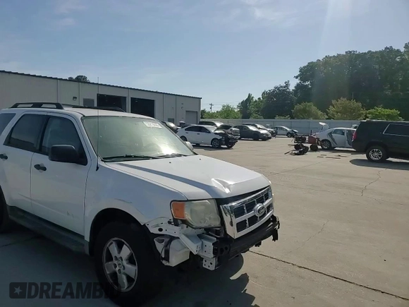 2009 Ford Escape XLS with VIN 1FMCU02719KB53740, listed as a Copart auction lot 55210035 with 144,672 mi miles and Salvage title. Bid and sale history available at DreamBid. Image 13.