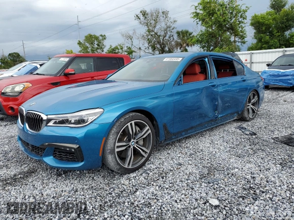 2019 BMW 7 Series 750i z VIN WBA7F0C51KGM25707, wystawiony jako Copart lot #61950495 z przebiegiem 56 768 mil mil oraz Nie do naprawy • Non repairable. Historia ofert i sprzedaży dostępna na DreamBid. Obrazek 1.