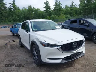 2018 Mazda CX-5 Grand Touring with VIN JM3KFBDM0J0308813, listed as a IAAI auction lot 42657978 with 78,119 mi miles and . Bid and sale history available at DreamBid. Image 1.