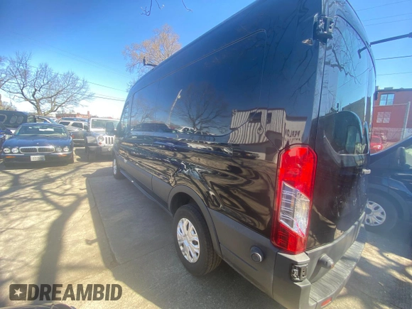 2015 Ford Transit Cargo with VIN 1FTNR2CMLFKA14542, listed as a Copart auction lot 52863735 with 134,970 mi miles and Clean title. Bid and sale history available at DreamBid. Image 3.