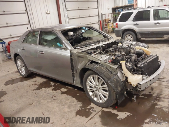 2013 Chrysler 300 with VIN 2C3CCAKT9DH581098, listed as a IAAI auction lot 41411138 with 104,732 mi miles. Bid and sale history available at carsss.com. Image 1.