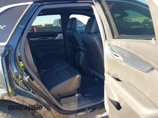 2024 Cadillac XT5 FWD Premium Luxury with VIN 1GYKNCRS4RZ729461, listed as a IAAI auction lot 41411300 with 5,760 mi miles. Bid and sale history available at carsss.com. Image 8.