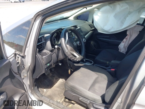 2020 Honda Fit LX z VIN 3HGGK5H44LM729036, wystawiony jako IAAI lot #41840623 z przebiegiem 134 277 mil mil oraz . Historia ofert i sprzedaży dostępna na DreamBid. Obrazek 5.