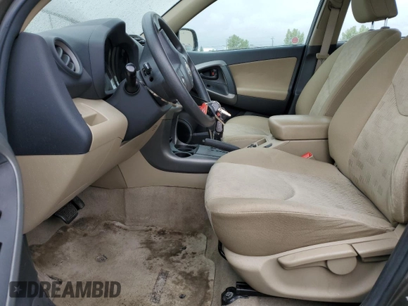 2010 Toyota RAV4 with VIN 2T3ZF4DV3AW031047, listed as a Copart auction lot 60877665 with 214,938 mi miles and Salvage title. Bid and sale history available at DreamBid. Image 7.