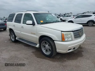 2003 Cadillac Escalade z VIN 1GYEC63T43R215381, wystawiony jako IAAI lot #42133080 z przebiegiem 218 909 mil mil oraz . Historia ofert i sprzedaży dostępna na DreamBid. Obrazek 1.