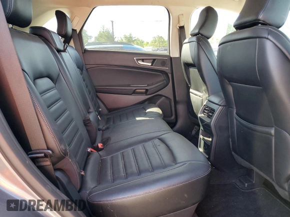 2024 Ford Edge SEL z VIN 2FMPK4J90RBA77908, wystawiony jako Copart lot #57846315 z przebiegiem 18 990 mil mil oraz Nie do naprawy. Historia ofert i sprzedaży dostępna na DreamBid. Obrazek 11.