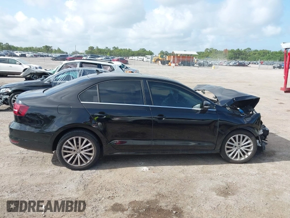 2016 Volkswagen Jetta SEL z VIN 3VWL07AJ2GM259395, wystawiony jako IAAI lot #42448235 z przebiegiem 101 032 mil mil oraz . Historia ofert i sprzedaży dostępna na DreamBid. Obrazek 13.