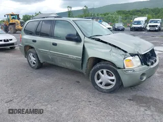 2004 GMC Envoy SLE z VIN 1GKDT13S142439007, wystawiony jako IAAI lot #42320661 z przebiegiem 173 704 mil mil oraz . Historia ofert i sprzedaży dostępna na DreamBid. Obrazek 1.