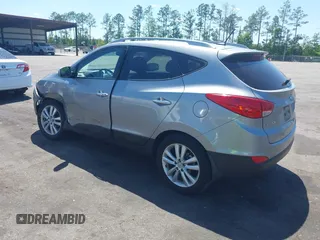 2013 Hyundai Tucson GLS with VIN KM8JU3AC4DU588062, listed as a IAAI auction lot 42080348 with 76,937 mi miles. Bid and sale history available at carsss.com. Image 3.