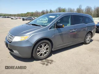 2011 Honda Odyssey Touring with VIN 5FNRL5H97BB031166, listed as a Copart auction lot 61274055 with 150,733 mi miles and Clean title. Bid and sale history available at DreamBid. Image 1.