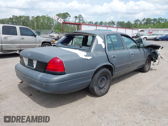 2001 Ford Crown Victoria Police Interceptor z VIN 2FAFP71W71X143506, wystawiony jako IAAI lot #41962780 z przebiegiem 254 040 mil mil oraz . Historia ofert i sprzedaży dostępna na DreamBid. Obrazek 4.