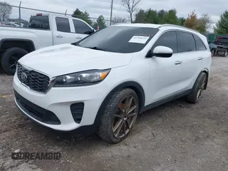 2019 Kia Sorento LX with VIN 5XYPG4A30KG524272, listed as a IAAI auction lot 41786623 with 124,942 mi miles and . Bid and sale history available at carsss.com. Image 2.
