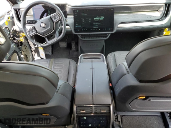 2025 Rivian R1S Adventure z VIN 7PDSGBBA2SN051004, wystawiony jako Copart lot #58999005 z przebiegiem 786 mil mil oraz Szkoda całkowita • Salvage title. Historia ofert i sprzedaży dostępna na DreamBid. Obrazek 8.