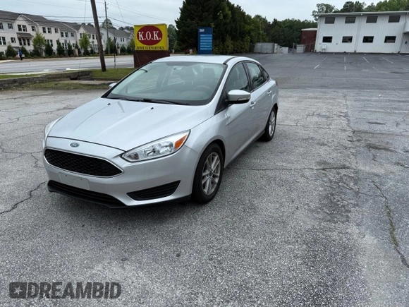 2017 Ford Focus SE with VIN 1FADP3F28HL28437, listed as a Copart auction lot 57904285 with 72,966 mi miles and Clean title. Bid and sale history available at DreamBid. Image 2.